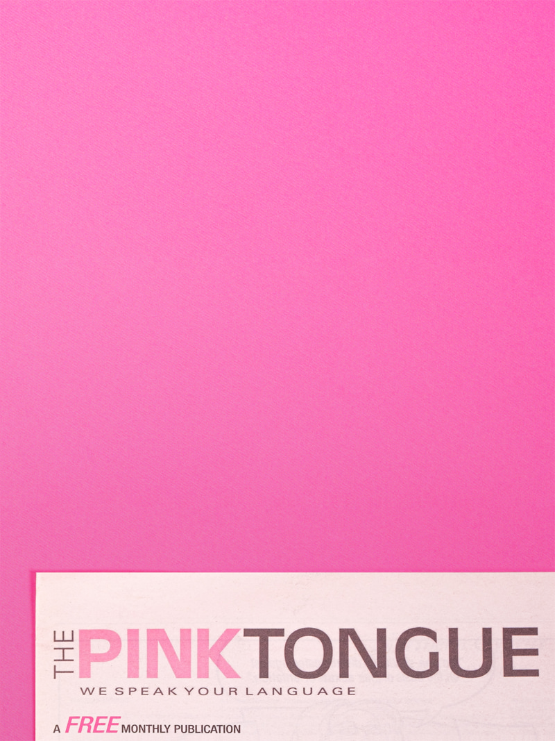 Art directed, cropped, aerial photo of The Pink Tongue LGBTIQ newspaper, publisher of the Squeers comic, on a pink background.
